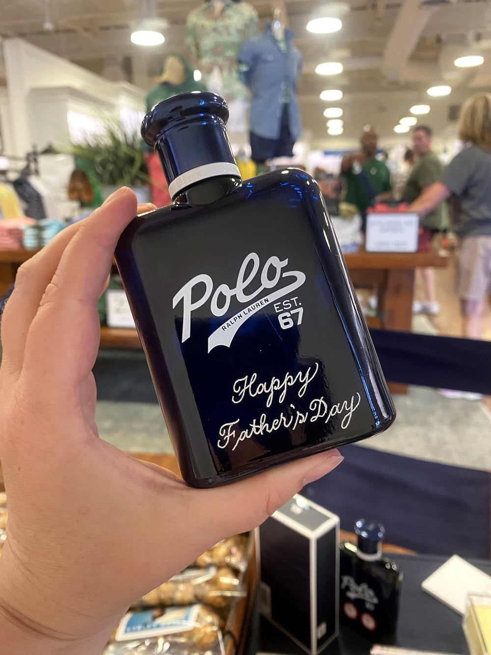 Polo Ralph Lauren fragrance bottle personalized with hand engraving for a Father's Day luxury retail event in New York City.