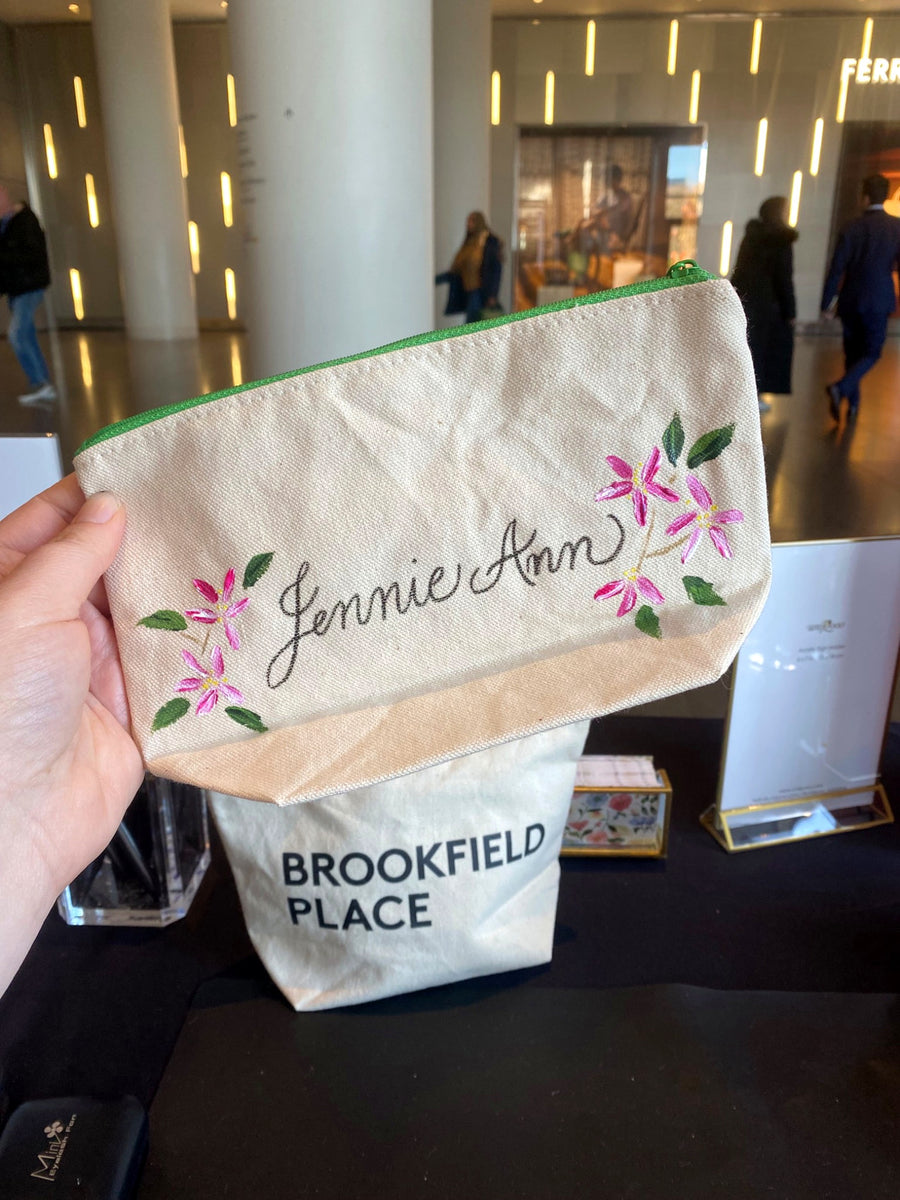 Personalized canvas gift pouch featuring elegant script lettering and pink hand-painted flowers by NYC live event calligrapher The Poppy Pen.