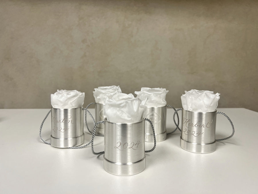 Personalized Venus et Fleur silver rose gifts with white and blush pink roses for a New York City brand activation