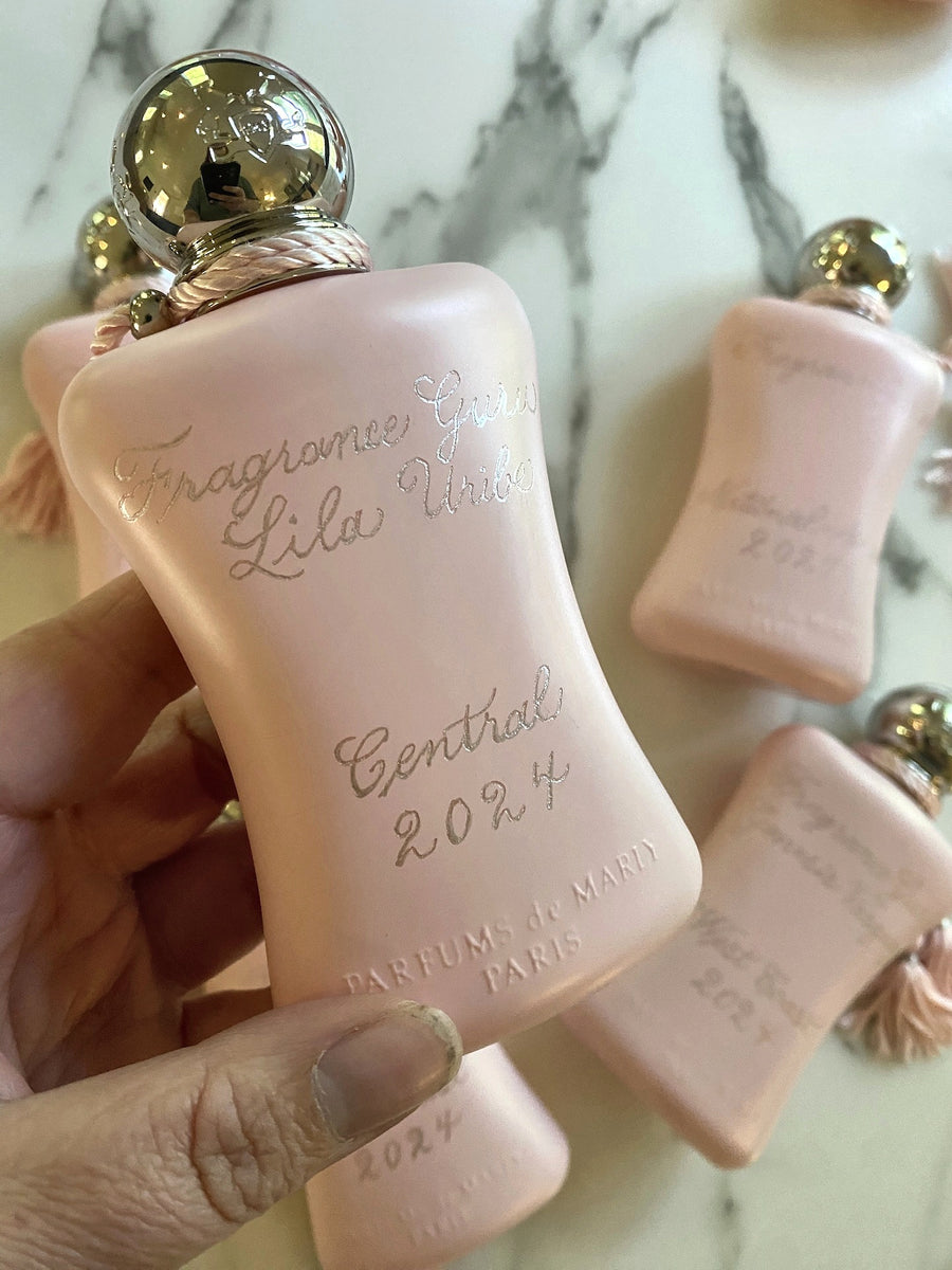 Parfums de Marly Delina bottle with silver-filled hand engraving recognizing an Eventing Excellence award recipient.