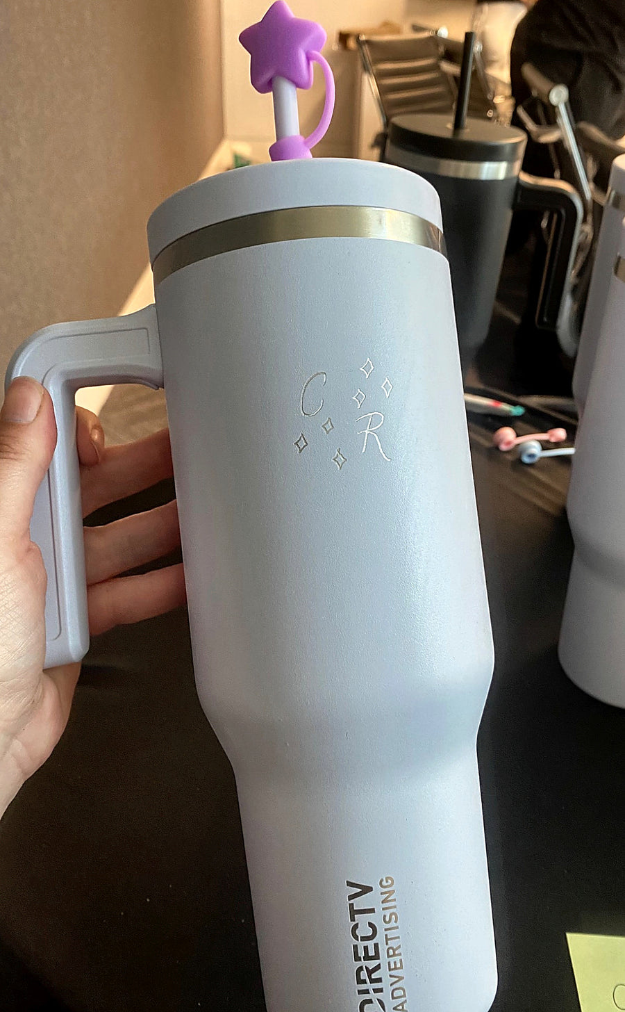 Personalized tumbler featuring hand-engraved initials and delicate decorative accents for a corporate gifting event in NYC.