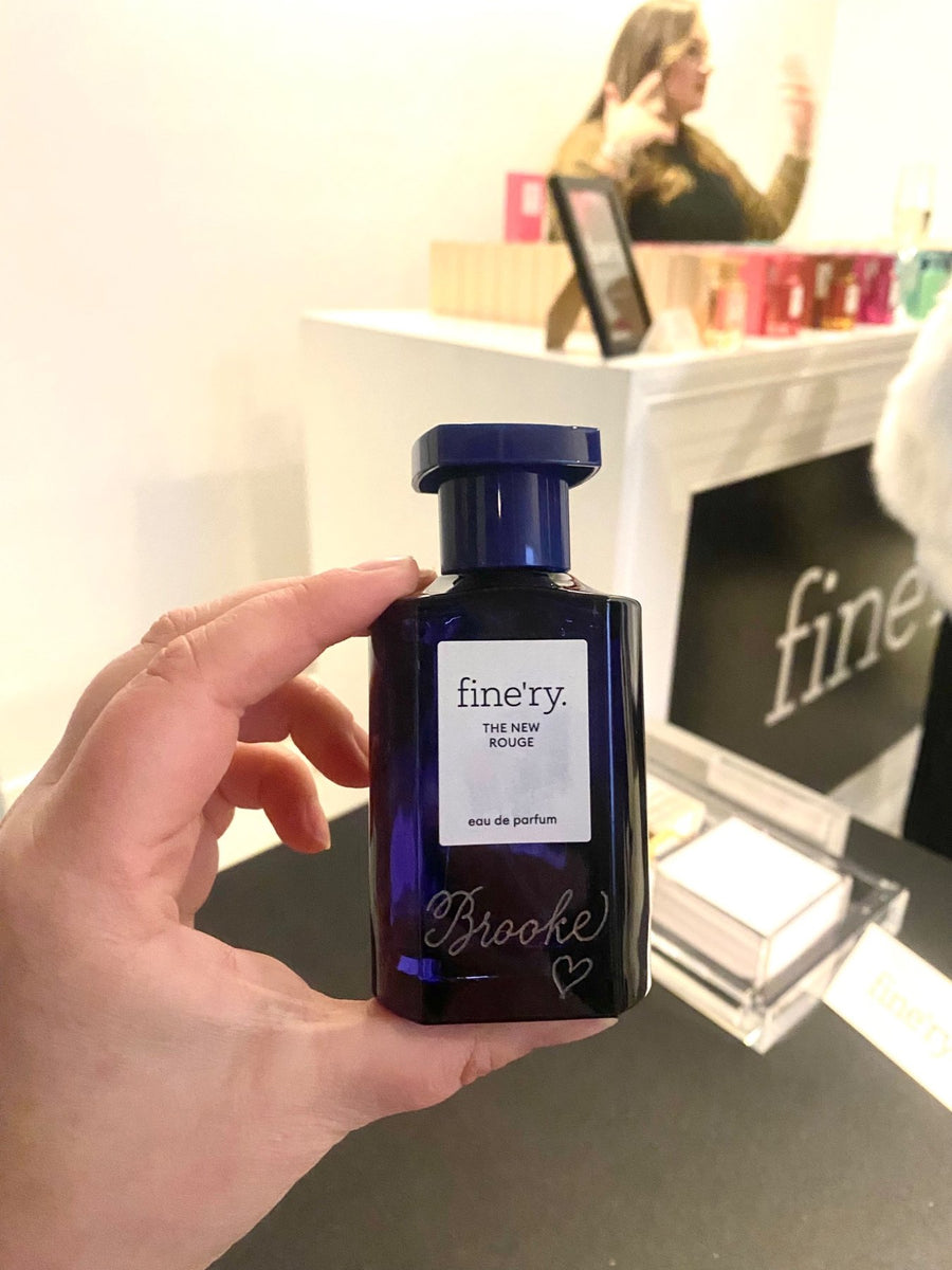 Personalized Fine'ry The New Rouge perfume bottle featuring custom script lettering by The Poppy Pen, a New York City live event engraver.