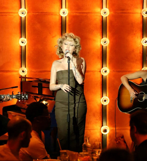 Noah Cyrus performing live at the grand opening celebration of So & So's Piano Bar in New York City.
