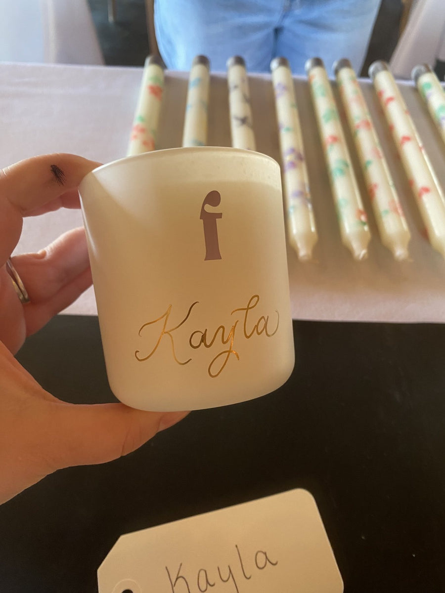 Being Frenshe candle personalized with elegant gold hand calligraphy by New York calligrapher The Poppy Pen.